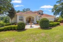 This stunning 2 story home sits on a beautiful landscaped corner for sale in Tallahassee Florida Leon County County on GolfHomes.com