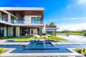 Step into unparalleled luxury in this brand-new custom estate for sale in Jupiter Florida Palm Beach County County on GolfHomes.com