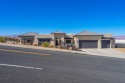 Perched in Southgate Hills, this stunning warm contemporary home for sale in Saint George Utah Washington County County on GolfHomes.com