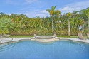 Enviably set on the Wanderers Golf Course, this astonishing for sale in Wellington Florida Palm Beach County County on GolfHomes.com