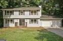 This charming 4-bedroom 3-bath home is perfect for a growing for sale in Stone Mountain Georgia De Kalb County County on GolfHomes.com