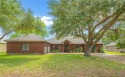 Elegant all-brick that overlooks a pond, Rockport golf course for sale in Rockport Texas Aransas County County on GolfHomes.com