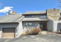 Escape to your own retreat nestled between shimmering Cheat Lake for sale in Morgantown West Virginia Monongalia County County on GolfHomes.com