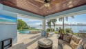 LOOKING FOR PEACE AND TRANQUILITY WITH SWEEPING WATER VIEWS? for sale in Holmes Beach Florida Manatee County County on GolfHomes.com