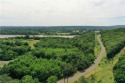 5 acres M/L with road leading to timbered property for hunting for sale in Ozark Arkansas Franklin County County on GolfHomes.com