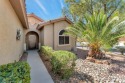 Discover the epitome of easy living in this charming for sale in Las Vegas Nevada Clark County County on GolfHomes.com