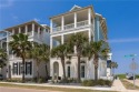 VIEWS VIEWS VIEWS! Experience elevated coastal living in this for sale in Port Aransas Texas Nueces County County on GolfHomes.com