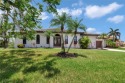 Prepare to be captivated by this extraordinary Gulf Access for sale in Punta Gorda Florida Charlotte County County on GolfHomes.com