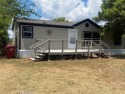 3-2-2cpt on 2 lots in The City of West Tawakoni! Across from the for sale in West Tawakoni Texas Hunt County County on GolfHomes.com