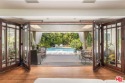 Architectural Retreat with Lush Gardens and Private Guest Suite for sale in Los Angeles California Los Angeles County County on GolfHomes.com