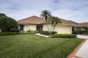 Located on the 8th hole of the Gold Course, this charming Winged for sale in Stuart Florida Martin County County on GolfHomes.com