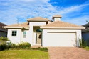 Located in the desirable gated Providence golf course community for sale in Davenport Florida Polk County County on GolfHomes.com