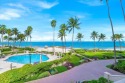 Live the Fisher Island lifestyle in this stunning 2 story beach for sale in Miami Beach Florida Miami-Dade County County on GolfHomes.com