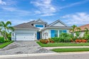 Exquisite Luxury Living in Country Club East.  Welcome to this for sale in Lakewood Ranch Florida Manatee County County on GolfHomes.com