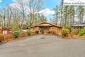 Welcome to 36 Larskpur, a beautiful mountain retreat nestled in for sale in Newland North Carolina Avery County County on GolfHomes.com