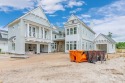 Stunning new Dune Construction designer home overlooking the for sale in Watersound Beach Florida Walton County County on GolfHomes.com