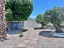 Beautiful home in Date Palm Country Club on the 14th hole of the for sale in Cathedral City California Riverside County County on GolfHomes.com
