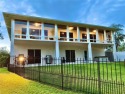 TRUE HIDDEN GEM ** GLAMOROUS WATERFRONT VIEWS * LUXURY ELEVATOR for sale in Haines City Florida Polk County County on GolfHomes.com