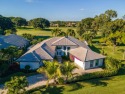 A luxurious contemporary design awaits you in this stunning 4 for sale in Wellington Florida Palm Beach County County on GolfHomes.com