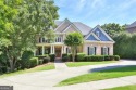 Nestled in the heart of the prestigious gated community of for sale in Suwanee Georgia Gwinnett County County on GolfHomes.com