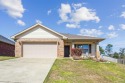 Look at this gorgous, BRICK,  better than new, move in ready for sale in Cantonment Florida Escambia County County on GolfHomes.com