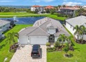 Discover refined, coastal, luxury living in this immaculate for sale in Bradenton Florida Manatee County County on GolfHomes.com