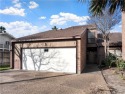 Welcome to this beautifully renovated Courtyard Townhome for sale in Corpus Christi Texas Nueces County County on GolfHomes.com