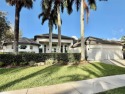 Live the ultimate Weston Hills lifestyle in this impeccably for sale in Weston Florida Broward County County on GolfHomes.com