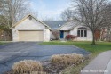 Welcome to 2202 Burton Pointe a lovely all-brick walkout ranch for sale in Grand Rapids Michigan Kent County County on GolfHomes.com