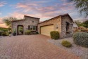 ABSOLUTELY GORGEOUS VILLA backing to the championship tee on the for sale in Gold Canyon Arizona Pinal County County on GolfHomes.com