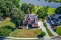 Lakefront living in Hamilton Mill! This spacious 6-bedroom for sale in Dacula Georgia Gwinnett County County on GolfHomes.com
