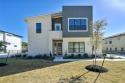 This stunning contemporary new construction offers a for sale in Austin Texas Travis County County on GolfHomes.com