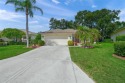Welcome to this beautifully updated 3BR,2BA home with a 2-car for sale in Sarasota Florida Sarasota County County on GolfHomes.com
