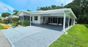 Modern and Updated 2 bedroom 2 bath home WITH EXTRAS in 55 + for sale in Zephyrhills Florida Pasco County County on GolfHomes.com