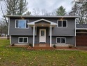 Spacious bi-level that has been fully renovated inside and out for sale in Kalkaska Michigan Kalkaska County County on GolfHomes.com