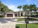 Welcome Home! This spectacular residence, boasting a lake and for sale in Weston Florida Broward County County on GolfHomes.com