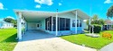 Furnished, spacious 2 bedroom 2 bath home in 55 + Resort style for sale in Zephyrhills Florida Pasco County County on GolfHomes.com