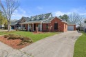 This spacious, single-story colonial-style home features four for sale in Rowlett Texas Dallas County County on GolfHomes.com