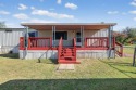 Video walk through available on YouTube! Singlewide on 3 lots for sale in Weatherford Texas Parker County County on GolfHomes.com