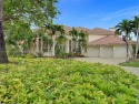 Nestled in a cul-de-sac, within the prestigious gated community for sale in Coral Springs Florida Broward County County on GolfHomes.com