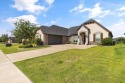 Beautiful like new GOLF COURSE home located in Harbor Lakes! for sale in Granbury Texas Hood County County on GolfHomes.com
