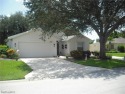 This Dover Model home has been professionally extended and for sale in Estero Florida Lee County County on GolfHomes.com