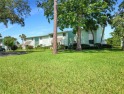 Welcome to Live Oak Village, a charming 55+ condominium for sale in Ocala Florida Marion County County on GolfHomes.com