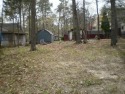 Vacant lot in Trails End.  Any/All buildings and vehicles will for sale in Horntown Virginia Accomack County County on GolfHomes.com