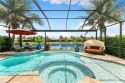 Discover an unparalleled lifestyle at 28507 Montecristo Loop, a for sale in Bonita Springs Florida Lee County County on GolfHomes.com