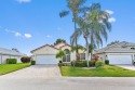 Welcome to this stunning lake-view home in the serene community for sale in Boynton Beach Florida Palm Beach County County on GolfHomes.com