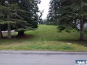 This almost 1/4 ac lot slopes up to the out of bound markers on for sale in Sequim Washington Clallam County County on GolfHomes.com
