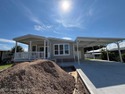 Brand-New 2026 Model Home in Barefoot Bay! Step into modern for sale in Barefoot Bay Florida Brevard County County on GolfHomes.com