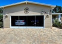 This meticulously cared-for home is as beautiful inside as it is for sale in Lakeland Florida Polk County County on GolfHomes.com