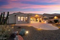 This stunning Tesoro model, on a large lot,  backs to an open for sale in Goodyear Arizona Maricopa County County on GolfHomes.com